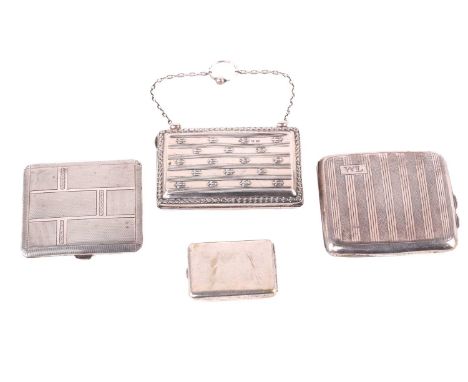 An Edwardian ladies silver purse, Birmingham 1909, on a silver suspension chain, with jade green silk concertina interior, 10
