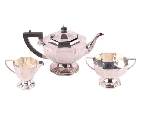 A late George V silver three piece tea set, makers initials R G &amp; S, Sheffield 1935, of octagonal form, 1077g gross