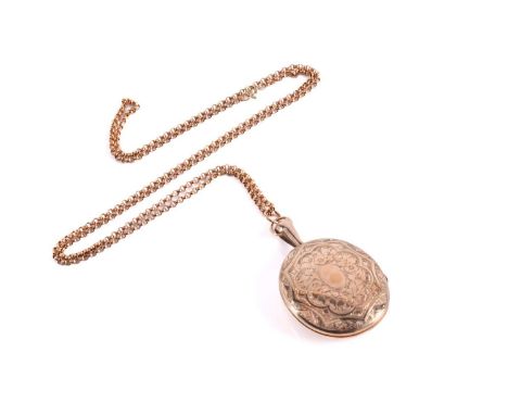 A large locket and chain, the locket measures 41x51mm with deep engraving and with a large top loop on a 2mm oval link chain 