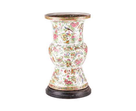 A Chinese Canton enamel Gu form porcelain vase, Qing, 19th century, the interior with a border of foliage, the exterior paint
