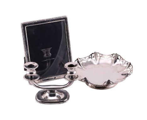 A silver photograph frame with easel back, 20.5cm x 15.5cm, by Carrs of Sheffield, 1994, together with a Pampaloni two branch