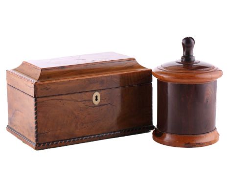 A George III satinwood and parquetry inlaid two-section tea caddy with a large sand-shaded fan burst motif to the moulded top