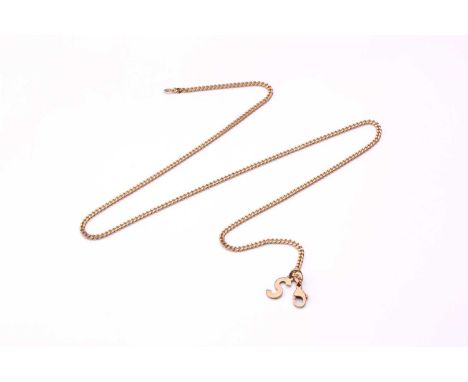 A 9ct gold alphabet pendant on curb link chain, the 'S' charm bears London assay marks, 1979, drop length measures 1.6 cm; th