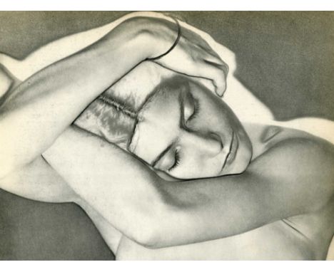 Man Ray (American, 1890 - 1976). "Sleeping Woman (Woman on Folded Arms) [solarization]". Original vintage photogravure. 1931.