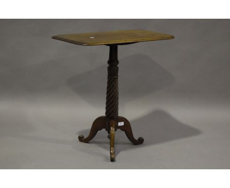 A 19th century mahogany rectangular tip-top wine table, the top with a moulded edge, raised on a spiral reeded column and tri