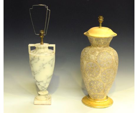 An Art Deco carved alabaster table lamp of twin-handled urn form, height 42cm, together with a gilt decorated pottery table l