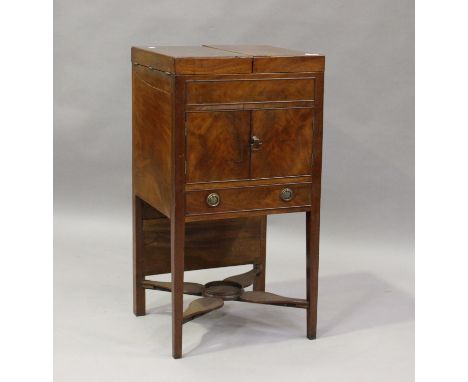 A George III mahogany gentleman's washstand, the double-hinged top above a cupboard and drawer, height 88cm, width 47cm, dept
