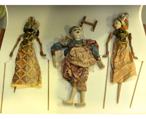 Two carved and painted Javanese puppets, a similar Thai puppet, and a selection of children's card miniature theatre sets and