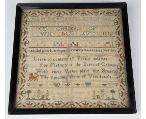 A George III needlework sampler by Louisa Losecamp, dated 1806, worked in coloured silks within a strawberry border, 29cm x 2