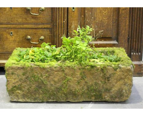 A carved stone trough planter of rectangular form, height 21cm, width 65cm, depth 39cm.Buyer’s Premium 29.4% (including VAT @