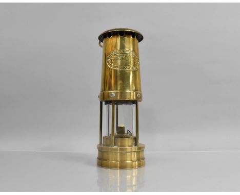 A Solid Brass Miner's Safety Lamp by Thomas and Williams, Aberdare, 25cms High