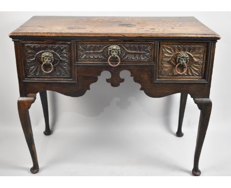 A 19th Century Oak Lowboy on Extended Cabriole Supports with Later Carved Decoration, Brass Lion Mask Ring Handles, 86cms Wid