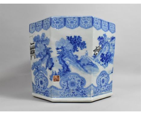 A Large Chinese Blue and White Hexagonal Planter Decorated with River Village Scene, Red Seal mark to Side and Precious Objec