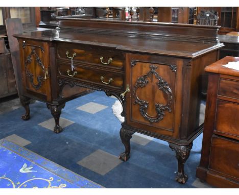 A Edwardian Mahogany Sideboard having Two Centre Drawers Flanked by Cupboards, One with Lined Cellarette the Other with Two S