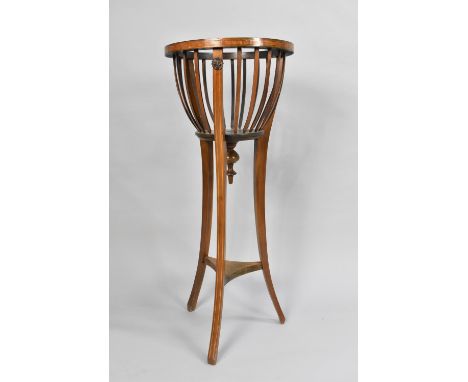 An Edwardian String Inlaid Mahogany Planter, 36cms Diameter and 91cms High