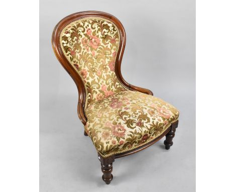 A Late Victorian Mahogany Framed Balloon Back Nursing Chair with Button Upholstery