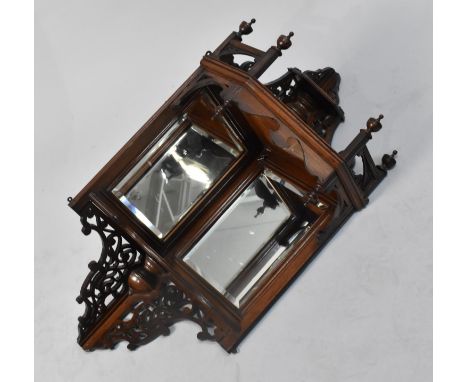 An Edwardian Mahogany Wall Hanging Mirrored Corner Shelf Unit with Raised and Pierced Gallery