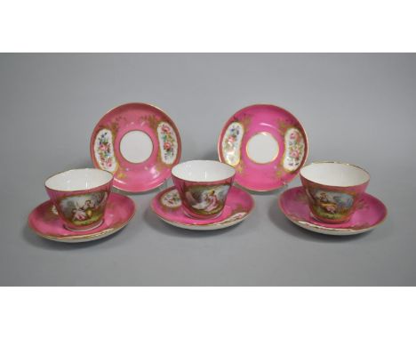 A Set of Three 18th Century Sevres Style Teacups on Pink Ground with Hand Painted Cartouches Depicting Maidens in Garden with