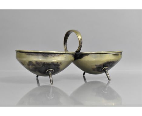 A Christopher Dresser (1843-1904) for Hukin and Heath Silver Plated Bonbon Dish with Twin Circular Ring Handle supported on F