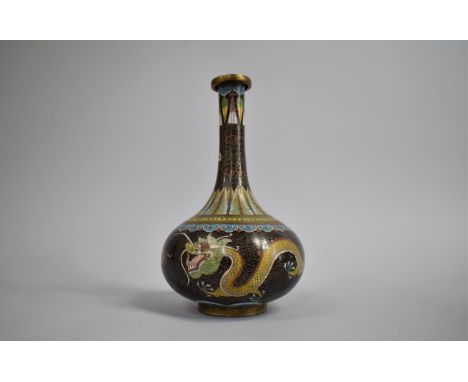 A Chinese Cloisonne Bottle Vase Decorated with Polychrome Enamels depicting Dragons Chasing Flaming Pearl on Black Ground, 23