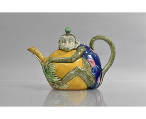 A Minton Majolica Monkey Teapot and Cover, C. 1874, Modelled as Monkey and Yellow Nut with Loop Handle Formed from Tail, 16cm