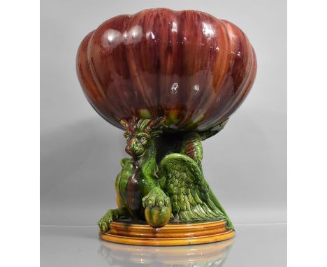 A Large and Impressive Late 19th Century Majolica Glazed Planter of Lobed Flower Form, Supported on Seated Mythical Winged Gr