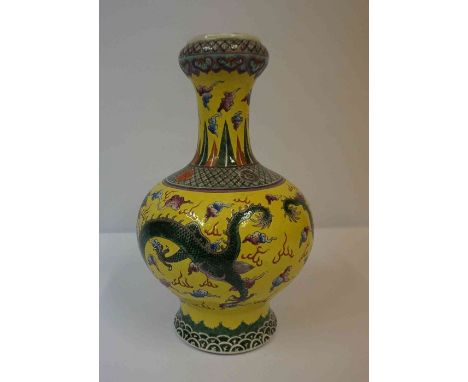 A Chinese Yellow Famille Rose Double Gourd Vase, Qing Dynasty (Tungchi period 1862) Decorated with allover polychrome panels 