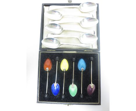 Six George VI silver and coloured enamel Coffee Spoons with bead stems, Birmingham 1951, in case and six Victorian Teaspoons 