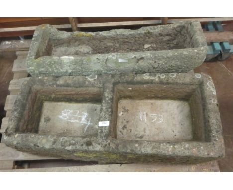 An oblong stone Trough A/F, approx 37 x 13 1/2 x 10in and an oblong two division stone Trough approx 37 1/2 x 16 x 11in