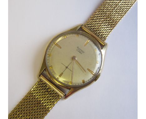 A Gentleman’s Rotary Wristwatch the champagne dial with applied gold baton markers and subsidiary seconds hand in 9ct gold ca