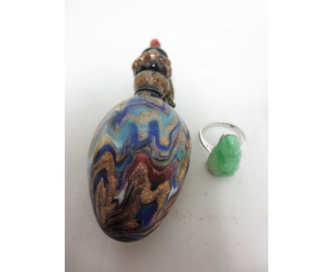 A 9ct white gold Ring set jade buddha, and a Venetian multi-coloured glass Scent Bottle and Stopper