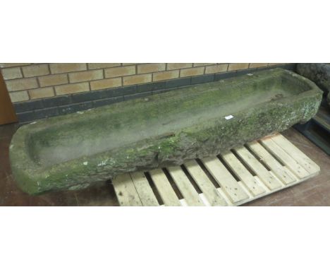 A 19th Century long Stone Trough with rounded ends, approx 6ft 2in x 1ft 4in