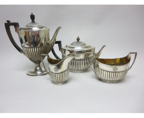 A Victorian silver Tea and Coffee Service of oval semi-fluted form engraved initials, London1885