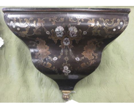 A 19th Century ebonised Bracket inlaid with brass and mother of pearl