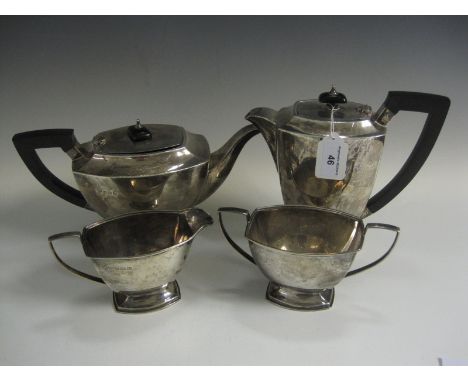 An Edward VIII silver four piece Tea Service with ebonised handles, Birmingham 1936