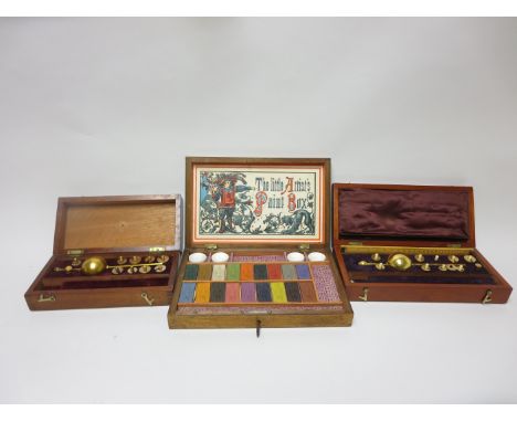  The Little Artist’s Paint Box  containing 18 watercolour blocks  Zulu colours , in walnut box, 10in, and two mahogany cased 