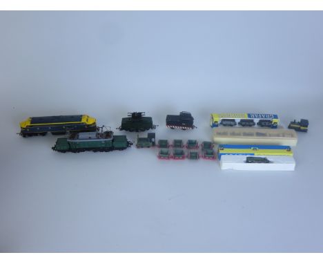 A unboxed HO Scale Crocodile Electric Locomotive, a Triang Bo-Bo Diesel Locomotive, 0-4-0 Pantograph Electric Locomotive and 