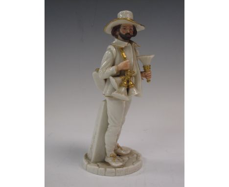 A Worcester Hadley Figure of  Ye Brush Seller , with gilt detail, titled on base, 7 1/2in H