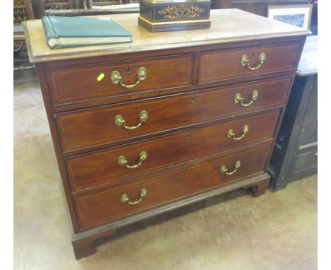 A Victorian mahogany Chest of two short and three long graduated drawers with satinwood stringing on bracket supports, 3ft 6i