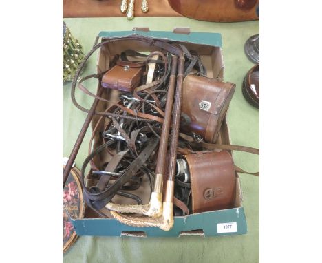 Two leather bound Hunting Whips with antler handle grips, both with gold mounts, one marked Brigg, the other Champion and Wil