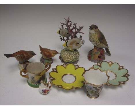 A Royal Worcester Hadley Ware two handled Mug, painted daffodils, a miniature Worcester flat back Jug, painted fruit, signed 
