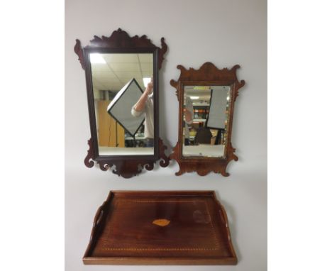 A Georgian style walnut framed Wall Mirror with gilt slip and bevelled plate, shaped surround, 25in, another, 31in, and a she