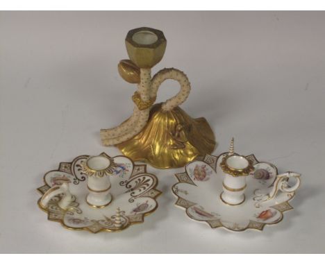 Two small Worcester Chamber Candlesticks with shaped rims, painted shell designs and gilt, one with restored handle, 4in, and