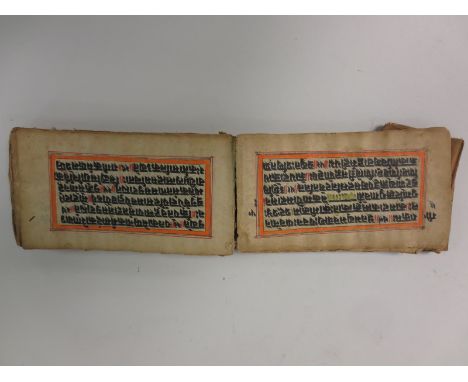 An Ethiopian Book of Solomon with parchment leaves; an Ethiopian Tablet Book of David, early 20th Century in a leather cover 