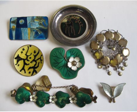 A collection of Norwegian enamel Brooches, one with matching Bracelet, a Norwegian national costume Brooch and a Pin Dish