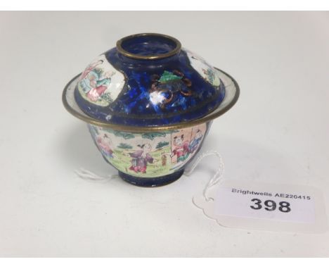 An 18th Century Oriental enamel lidded Bowl with figures in landscapes and scale blue ground, A/F