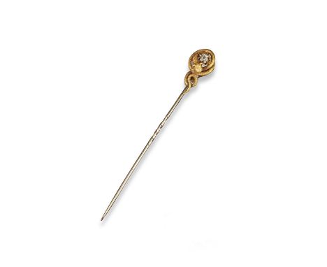 A tiger's eye and diamond set bangle, the triangular tiger's eye cabochons are set within a zig~zagged line of circular~cut d