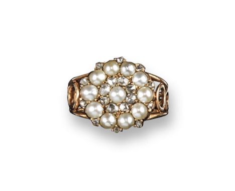 A 19th century pearl and diamond cluster ring, set in gold with figure of eight shoulders to the triple band. Size L 1/2. Box