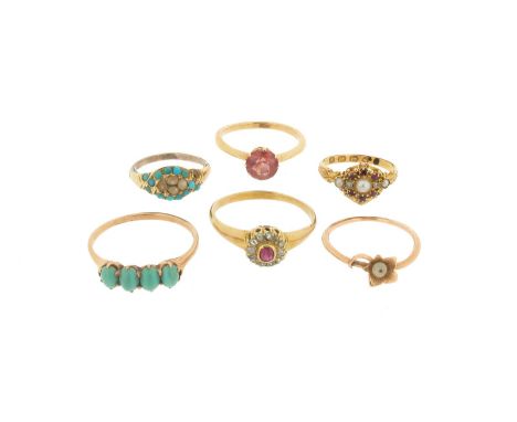 A circular pink tourmaline set gold ring, an 18ct gold cluster ring set with seed pearls with small diamonds and rubies, a ru