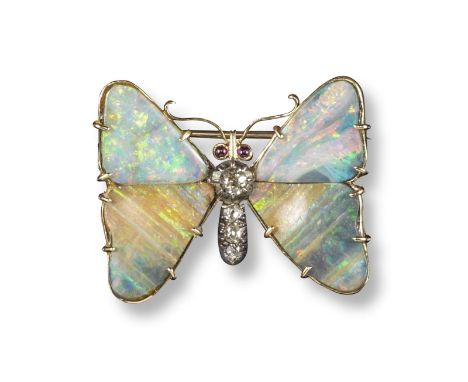 A 19th century opal and diamond butterfly brooch, the wings mounted with solid opal sections in a gold closed back mount. The